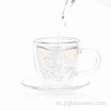 Taza de té de cristal popular con platillo